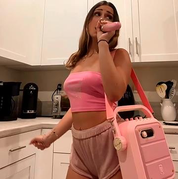 woman is carrying JYX TX02 karaoke machine