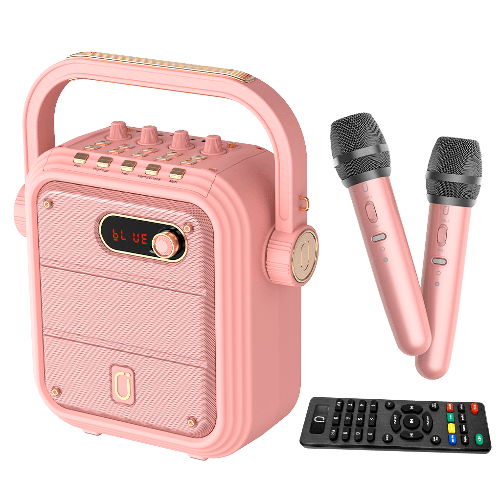JYX karaoke machine in pink with two wireless microphones and remote control
