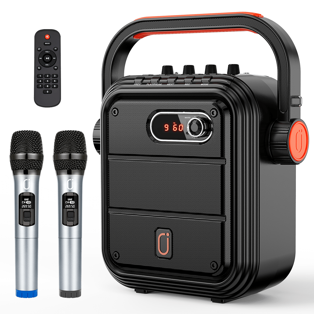 JYX 66BT black portable karaoke speaker with an integrated carry handle, two silver wireless microphones, and a remote control on a white background.