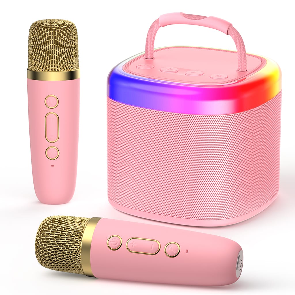 JYX D17 pink portable karaoke machine with rainbow LED lights and two pink wireless microphones with gold-colored grilles.