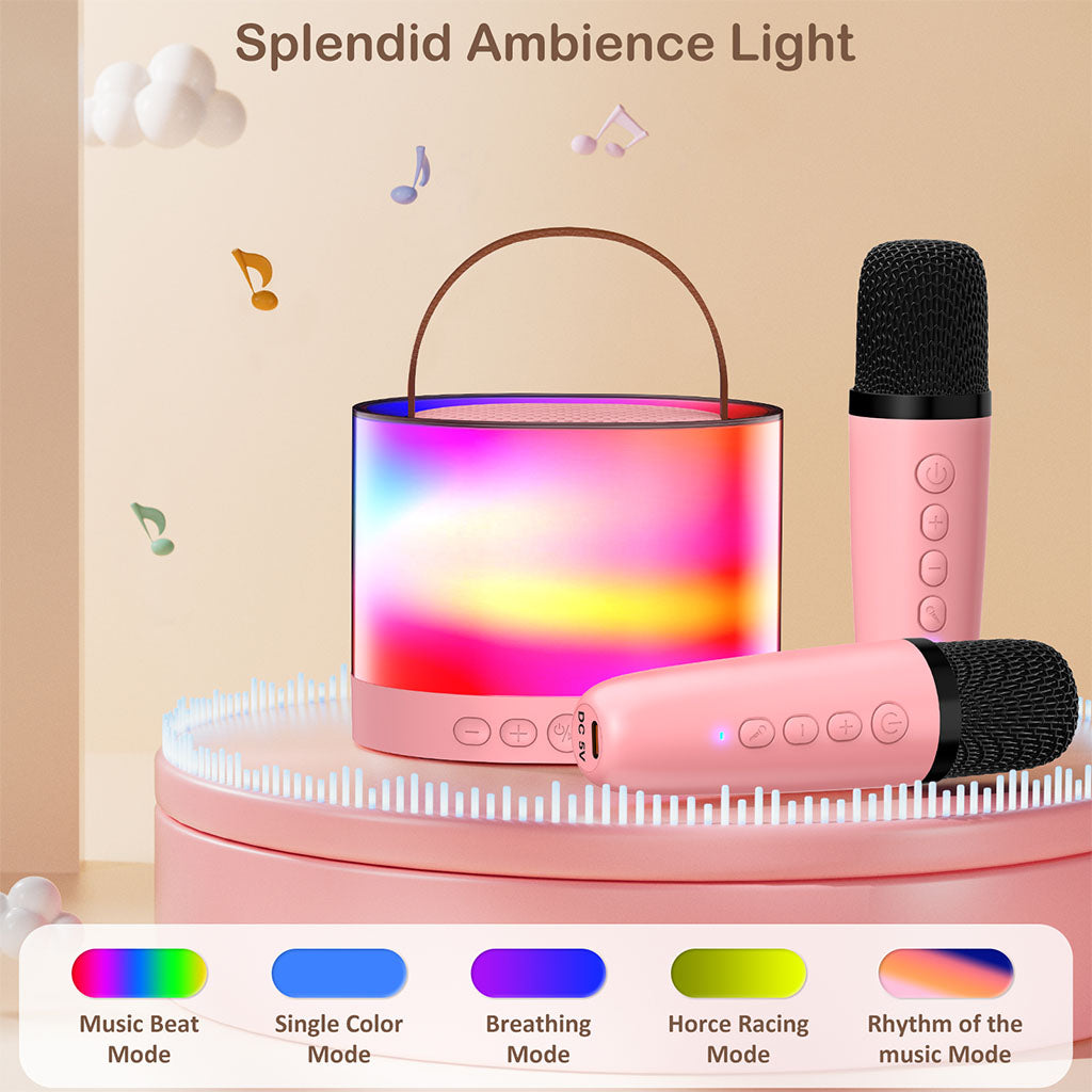 JYX D23 Mini Pink Karaoke Machine for kids with 2 wireless microphones, featuring splendid ambience light with 5 lighting modes.