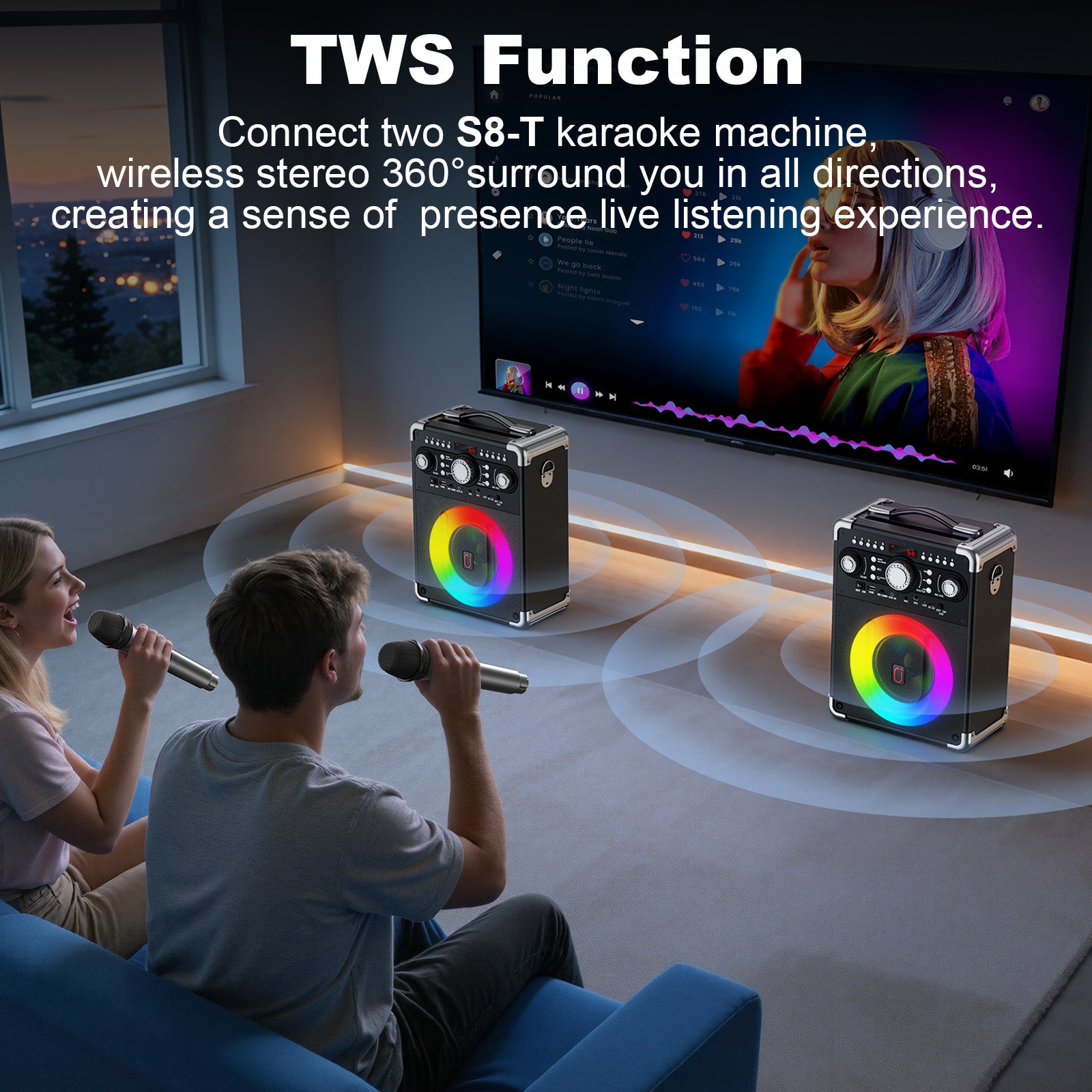 Two JYX S8 karaoke speakers positioned apart in a living room to demonstrate TWS wireless stereo pairing while a couple enjoys music and karaoke.